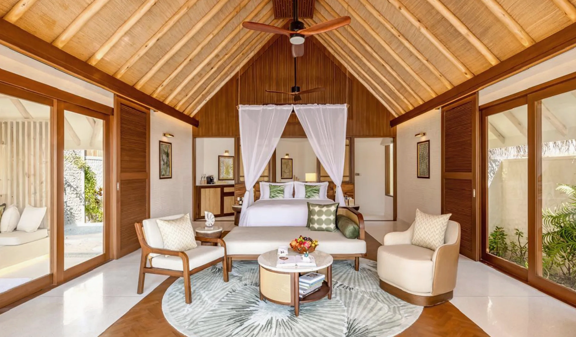 Villa bedroom at RAH GILI Maldives combining contemporary furnishings with relaxed island-inspired design