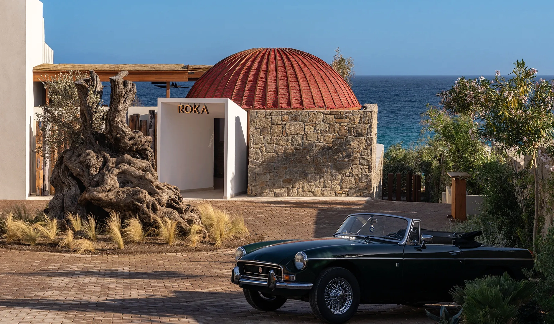 ROKA Japanese restaurant exterior at Fouquet’s Mykonos overlooking Paraga Beach.