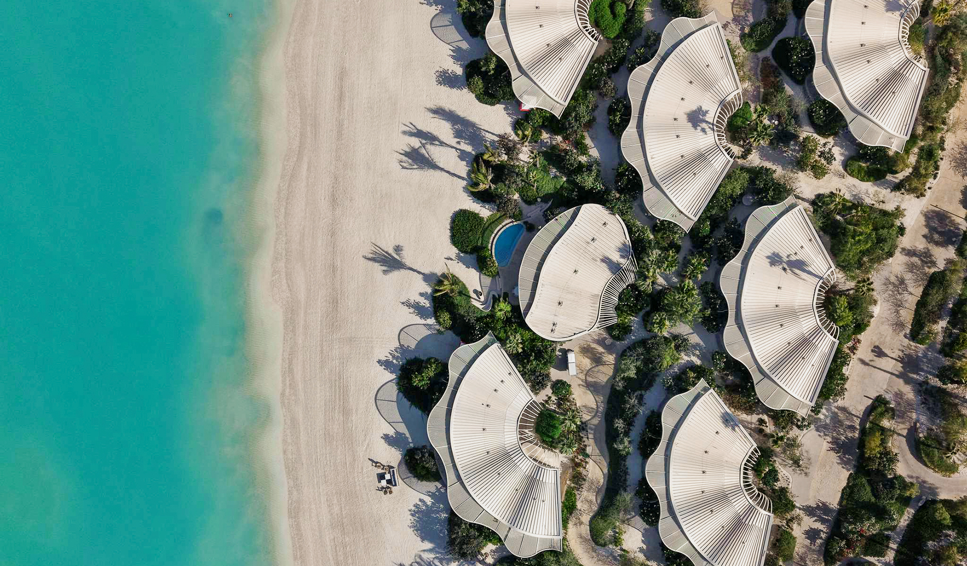 Stunning bird's-eye view of the exclusive villa enclave at SLS resort, ranked among the best hotels in Saudi Arabia for its pristine Shura Island location.